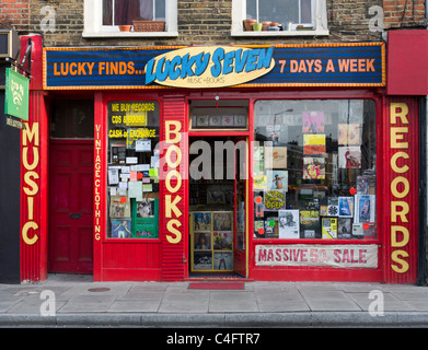 Secondhand books and records at small independent shop on Stoke Newington Church Street, Hackney, London, UK Stock Photo