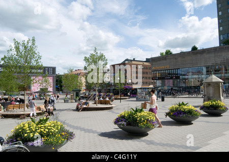 orebro sweden town square city cities swedish center centers shopping people walking in summer Stock Photo