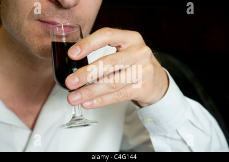 Man drinking a glass of Andalusian wine. Close view. Stock Photo