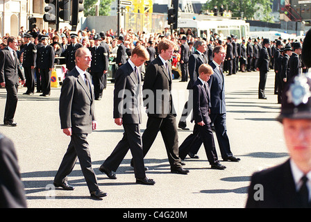 Prince Philip with Prince William , Viscount Althorpe , Prince Harry and Prince Charles follow the coffin of Princess Diana at her funeral procession in 1997 Stock Photo