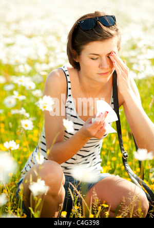 Girl with hayfever Stock Photo