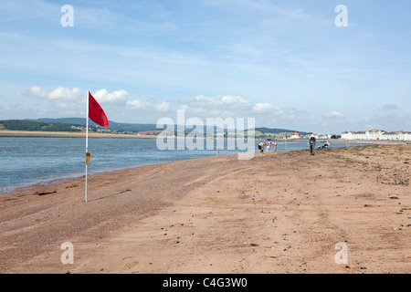 swimming warning notices flag on beach near exmouth devon uk Stock Photo