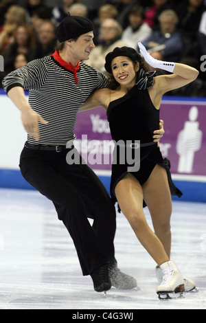 Andrea Chong and Guillame Gfeller compete at the 2010 BMO Skate Canada National Championships in London, Ontario, Canada. Stock Photo