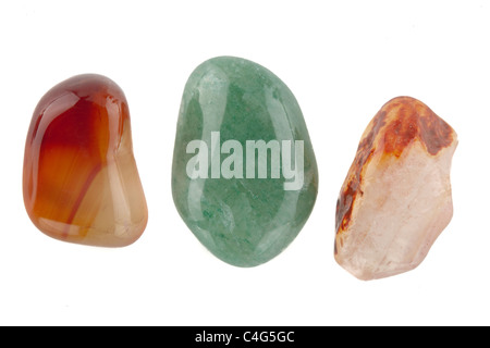 Three rock samples Agate microcrystalline silica from India Smoky Quartz from Brazil and the mineral Carnelian from India Stock Photo