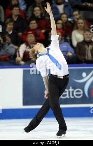Kevin Reynolds competes at the 2010 BMO Skate Canada National Championships in London, Ontario, Canada.  Stock Photo