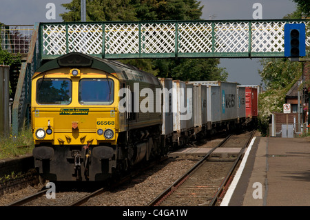 Freight train switching tracks on the Ipswich to Port of Felixstowe branch line, Trimley station, Suffolk, UK. Stock Photo