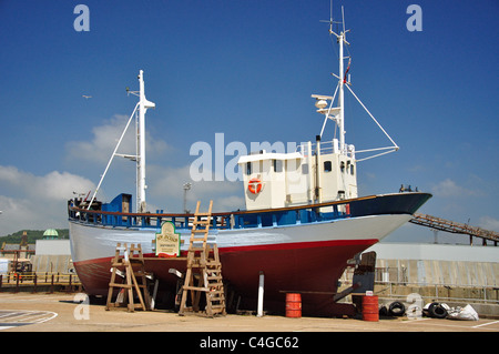 Wooden fishing boat in dry dock, Dover, Kent, England, United Kingdom Stock Photo