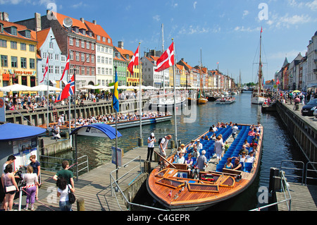 Cruise boat depot on Nyhavn Canal, Copenhagen (Kobenhavn), Kingdom of Denmark Stock Photo