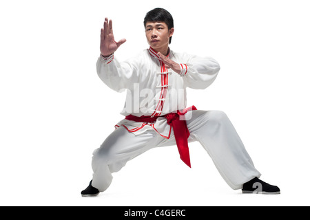 Focused Man Doing Martial Arts in Chinese Clothing Stock Photo
