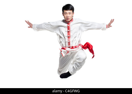 Man In Traditional Chinese Clothing doing Martial Arts Stock Photo