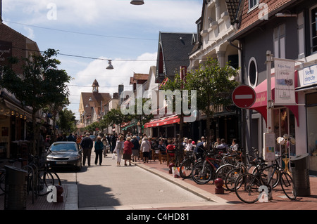 The busy Rue de Metz in Le Touquet-Paris-Plage, France . The street is lined with restaurants. Stock Photo