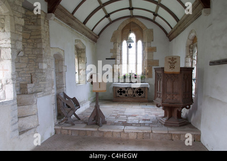 The chancel of the redundant 12th century church at Whitcombe near Dorchester. The poet William Barnes was curate here from 1847 to 1852. Dorset, UK. Stock Photo