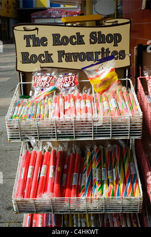 sticks of traditional rock on sale at the seaside Stock Photo