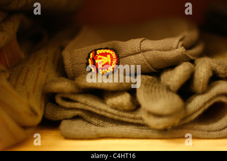 Military winter clothing / unifom of Stasi officials with the National Emblem of the former GDR. Leipzig, Germany Stock Photo