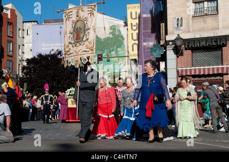 People dressed in traditional clothes during religious procession for Festival of San Isidro, Madrid, Spain Stock Photo