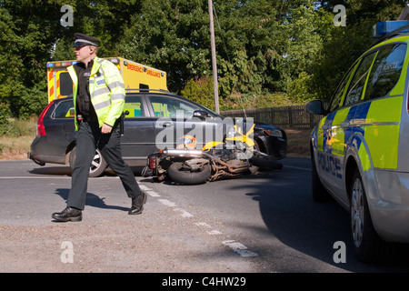 Aftermath of a road traffic accident involving a car & a motorbike. Stock Photo