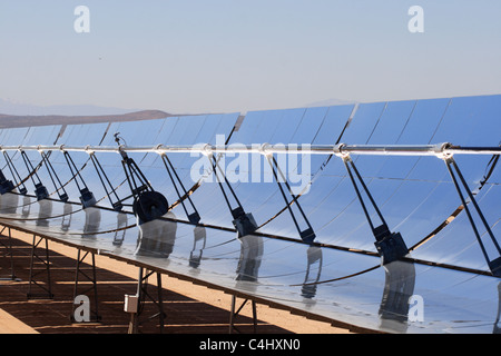 SEGS solar thermal energy electricity plant with parabolic mirrors concentrating the sunlight Stock Photo