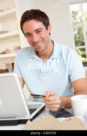 Man using credit card in shop. Cashless payment with pos terminal Stock ...