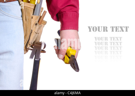Carpenter in tool belt closeup holds pliers over white background Stock Photo