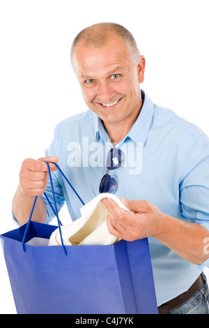 Elegant modern mature man hold shopping bags Stock Photo