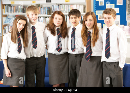 Portrait Of Group Of Teenage Students In Library Stock Photo