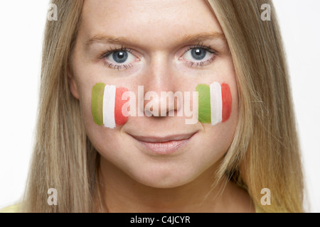 Young Female Sports Fan With Italian Flag Painted On Face Stock Photo