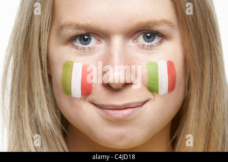 Young Female Sports Fan With Italian Flag Painted On Face Stock Photo