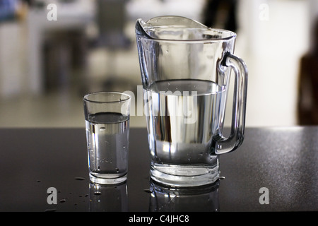 Water glass and carafe Stock Photo