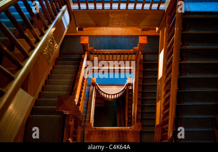 Looking down from the top floor of a beautiful and vintage Victorian Mansion makes an interesting graphic design. Stock Photo