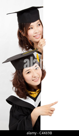 Group of graduates holding a blank banner Stock Photo