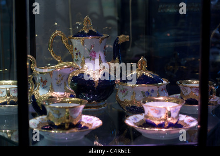 Antique porcelain coffee set in a show window Stock Photo