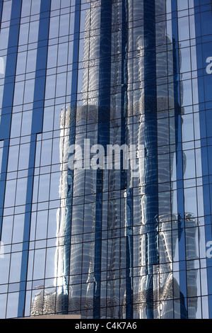 Reflex of Burj Khalifa palace in the front glass skyscraper, Dubai, United Arab Emirates ( UAE ) Stock Photo