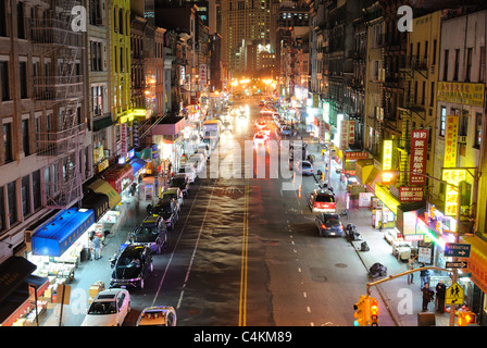 A commercial street in Chinatown, New York CIty, at night. October 24, 2010. Stock Photo