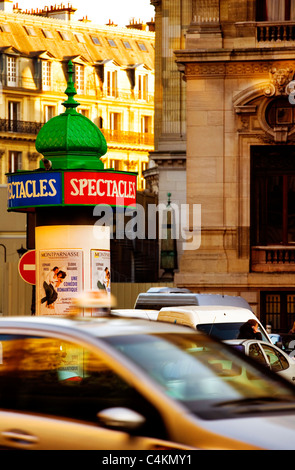 Street scene with kiosk and traffic, Paris, France, Europe Stock Photo