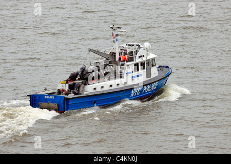 New York City Police boat patrols Hudson River in Manhattan Stock Photo