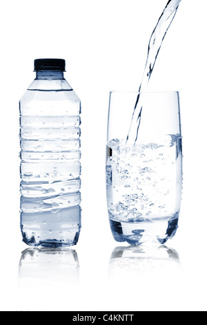 Mineral water in glass and bottle Stock Photo