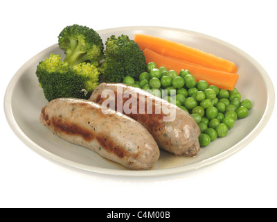 Freshly Cooked Thick Pork and Herb Sausages with Vegetables Against A White Background With A Clipping Path And No People Stock Photo