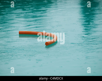 Rain in the swimming pool, ruined vacation Stock Photo