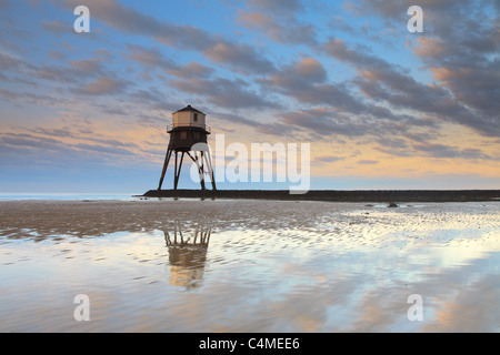 One of the unusual Victorian lighthouses at Dovercourt in England at sunrise. Stock Photo