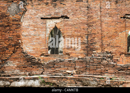 ancient brick wall at Wat Phra Ram khmer temple in ayutthaya, thailand Stock Photo