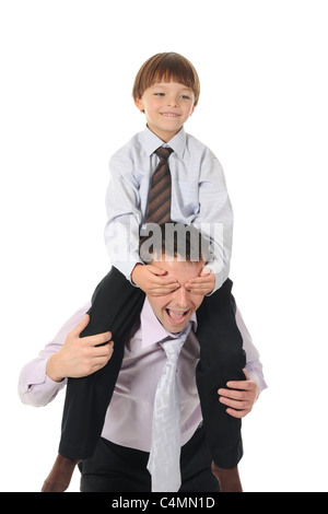 lucky son sitting on his father stretches Stock Photo