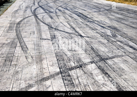 car tyre skid marks on road track Stock Photo