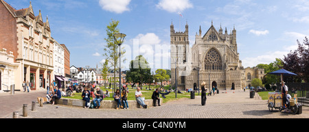 Horizontal panoramic view of Exeter Cathedral and Cathedral Square on a sunny day. Stock Photo