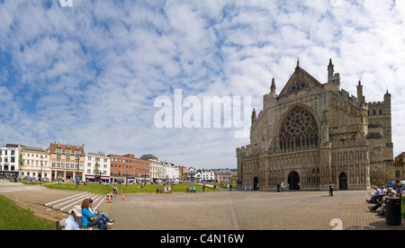 Horizontal panoramic view of Exeter Cathedral and Cathedral Square on a sunny day. Stock Photo
