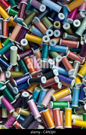 Reels of polyester thread on sale at market in La Reole, Bordeaux region of France Stock Photo