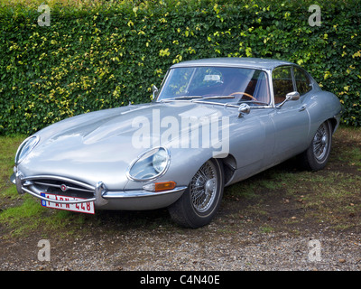 Silver Jaguar E-type 2+2 coupe sportscar with wire wheels Stock Photo