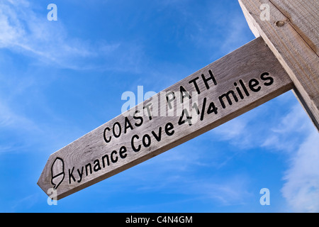 Signpost to Kynance Cove along the South West Coast Path on the Lizard Peninsula, Cornwall (UK) Stock Photo
