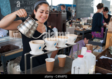 Slow dripped coffee at a kiosk in the New Amsterdam Market on South Street in New York Stock Photo