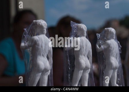 Small statues of Michelangelo's David wrapped in clear plastic for sale to tourists in Florence, Italy. Stock Photo