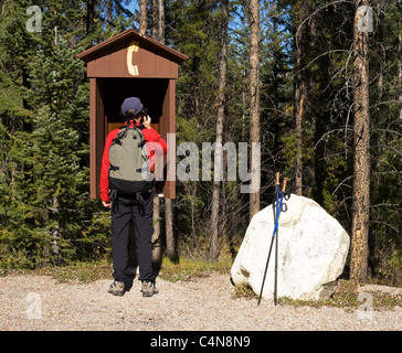 Hiker Calling On Outdoor Pay Phone Jasper National Park Alberta